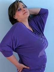 Huge breasted mature slut showing all